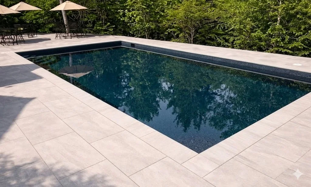 Pool remodel render with charcoal pebble finish