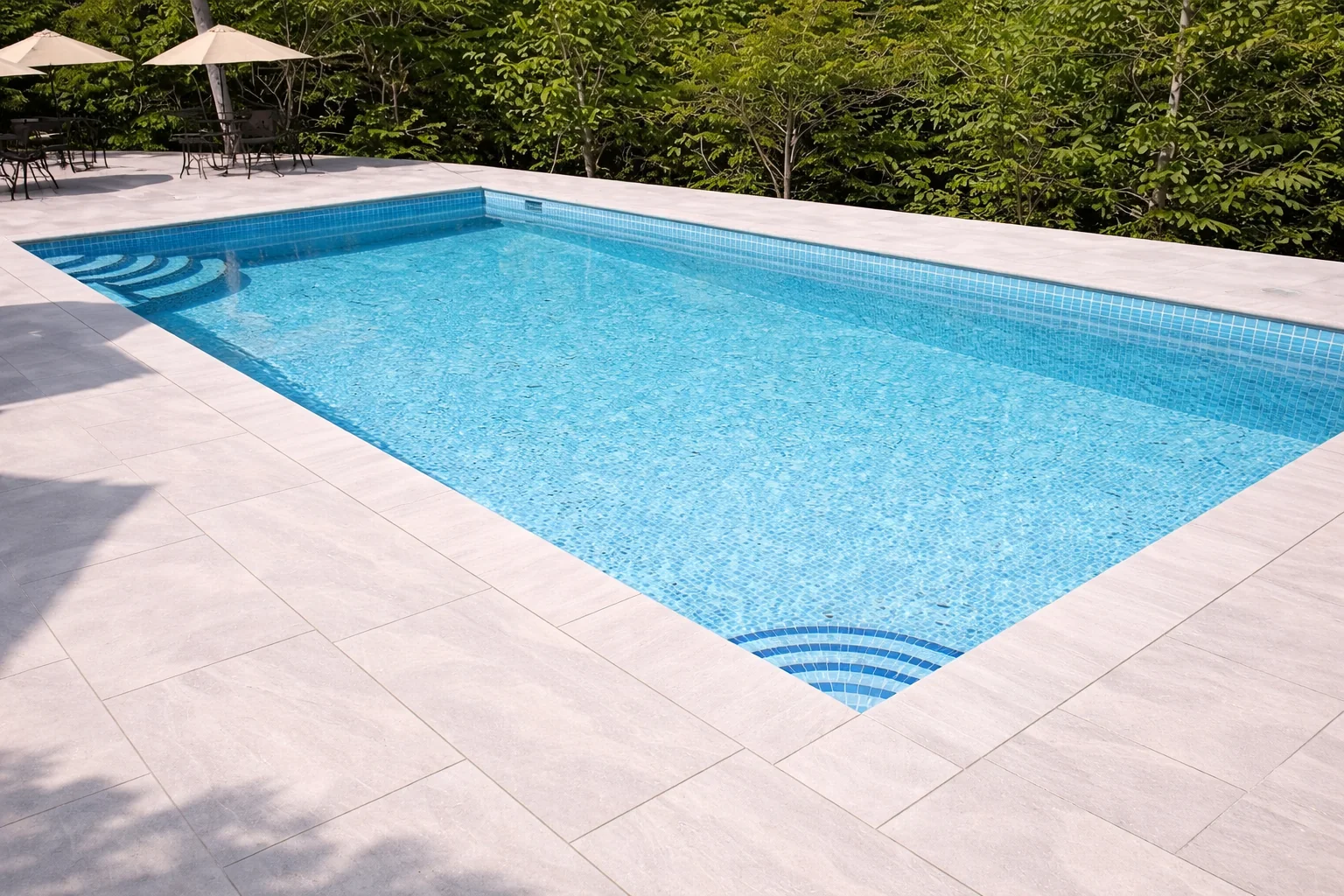 Pool remodel render with light blue glass mosaic